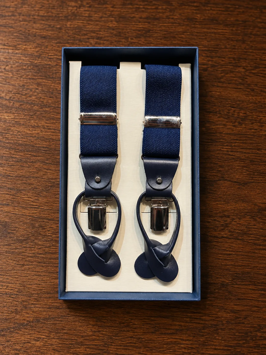 Bretelle blu con dettagli in vera pelle