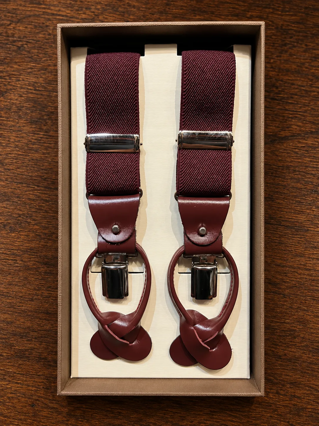Bretelle bordeaux con dettagli in vera pelle